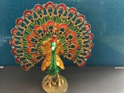 Dancing peacock with rhinestones